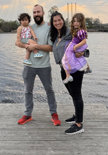 Paola Valencia-Cadena with her husband and two daughters
